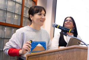 Two women at podium